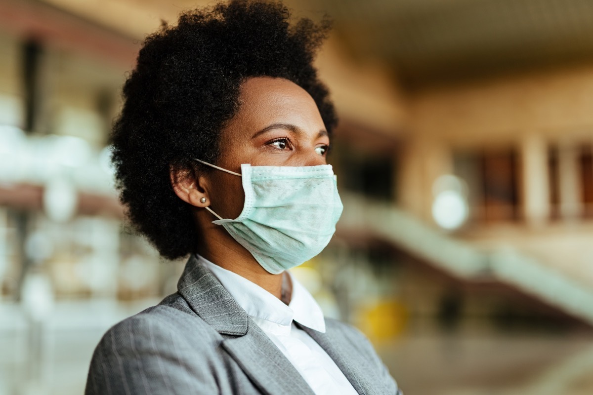 Professional woman wearing a mask