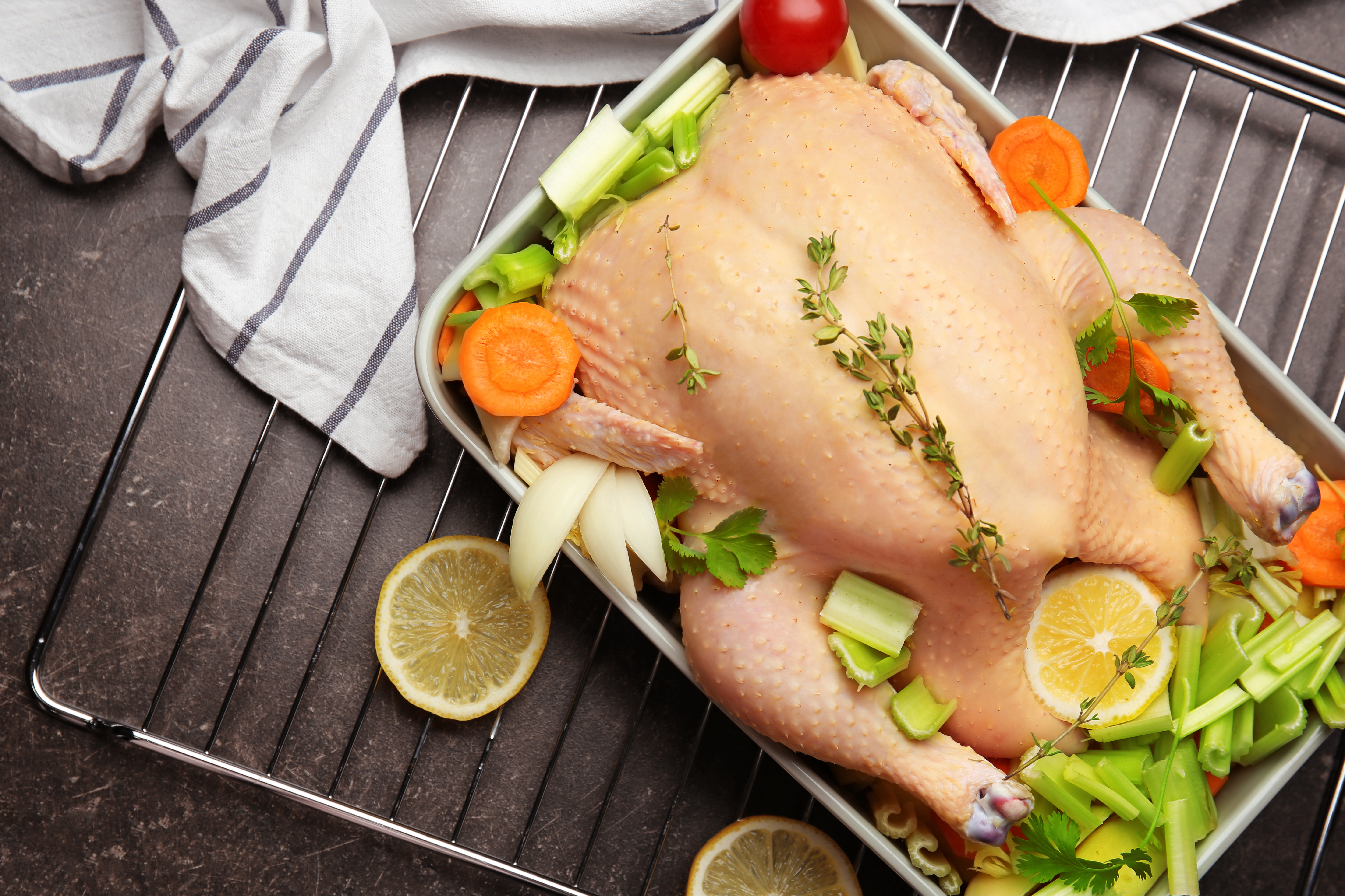 Thanksgiving turkey being rinsed. 