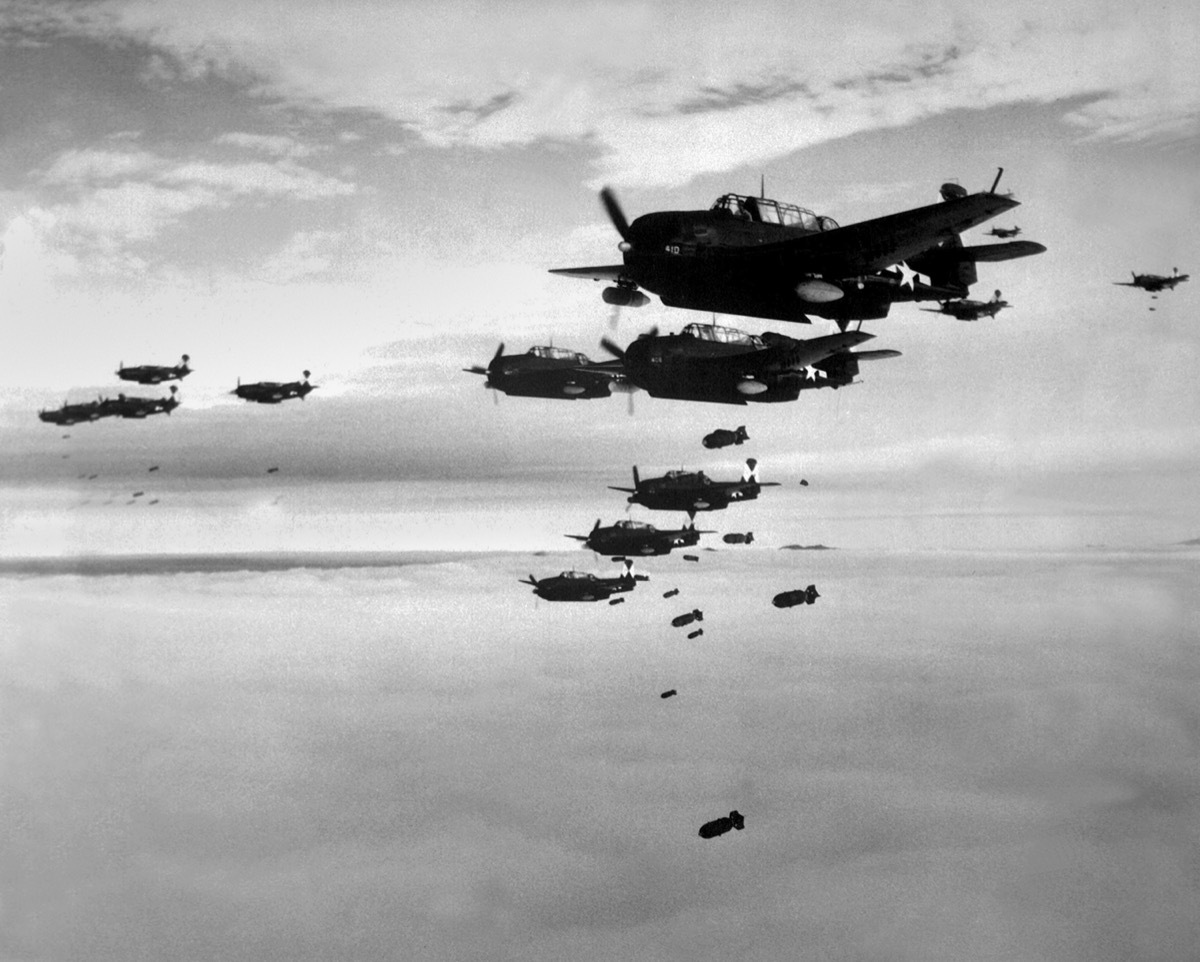 Bombs being dropped from planes in WWII