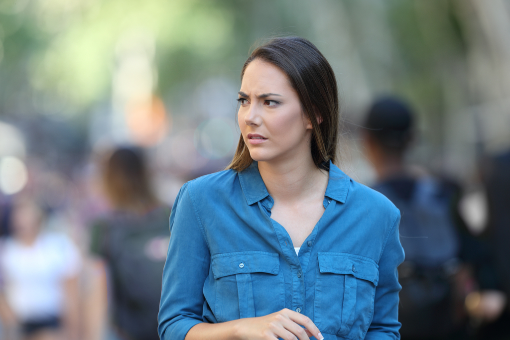 Uncomfortable Woman in Crowd Sensitive