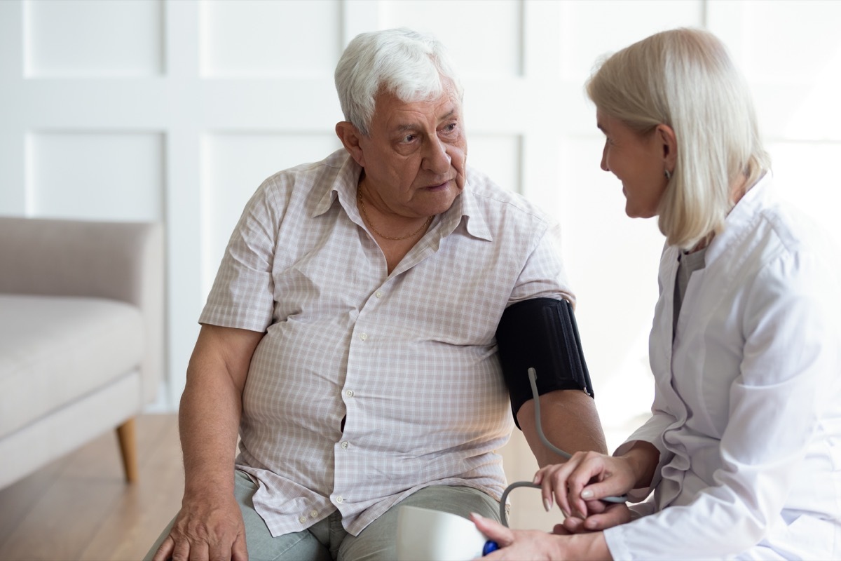 Doctor with older patient