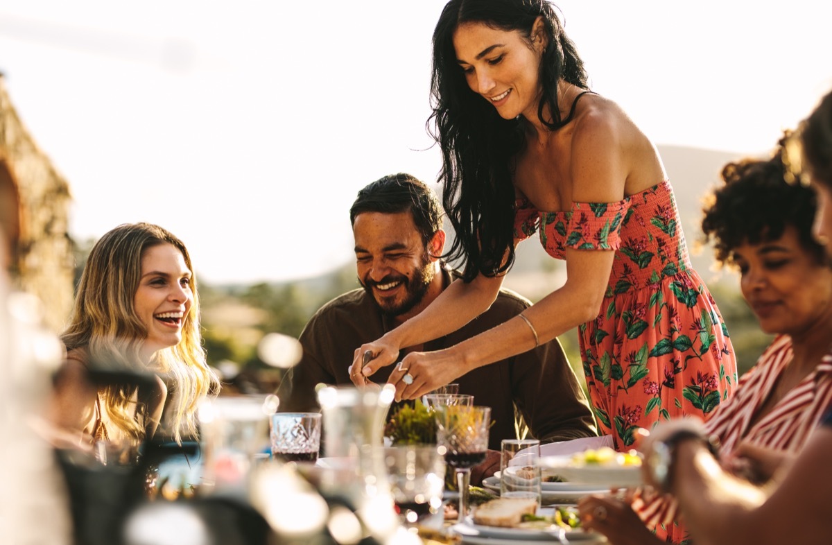 woman hosting party for friends