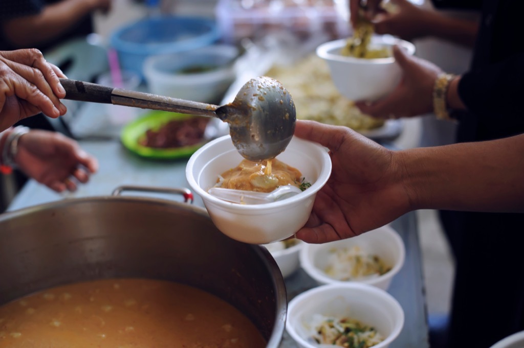 serving food at a soup kitchen