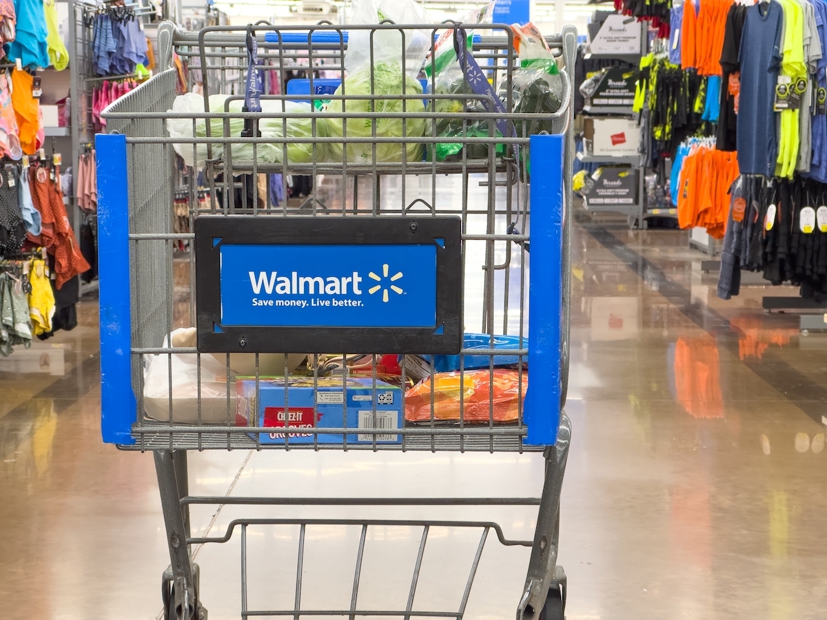 Closeup of an almost empty shopping cart inside local Walmart