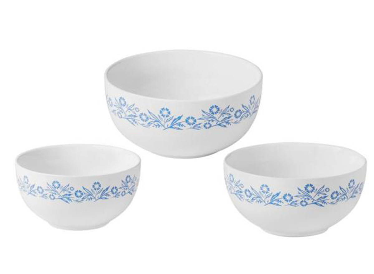 three white bowls with blue floral design 