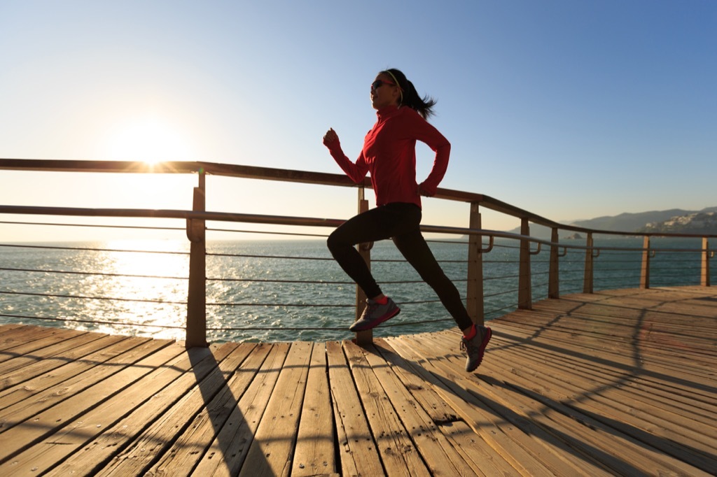 Woman running in sunshine