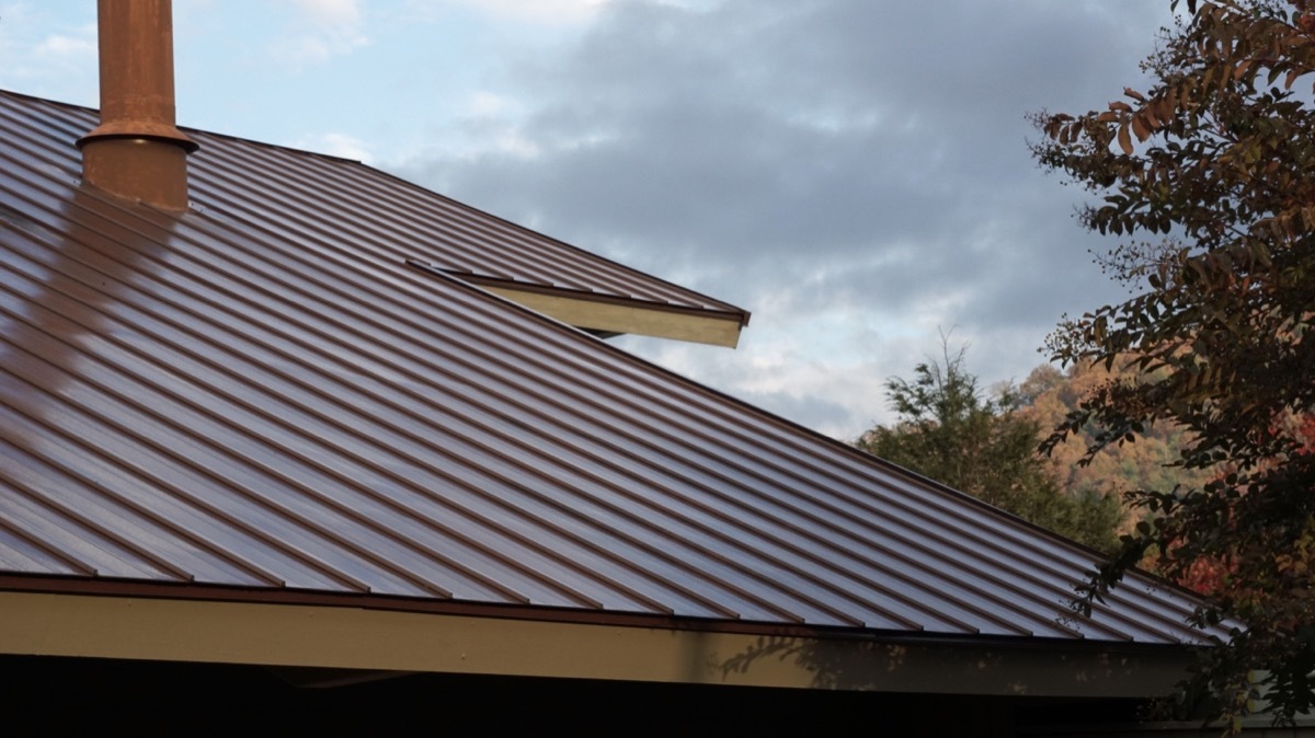 metal roof on home, vintage home upgrades