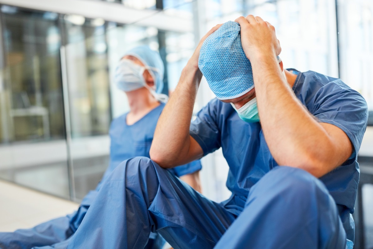 Two distraught doctors in hospital