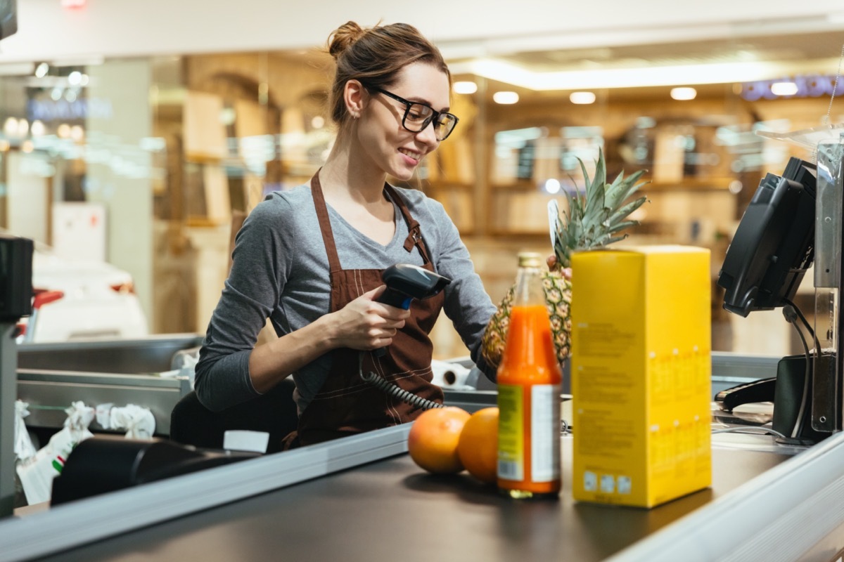 supermarket cashier scanning items