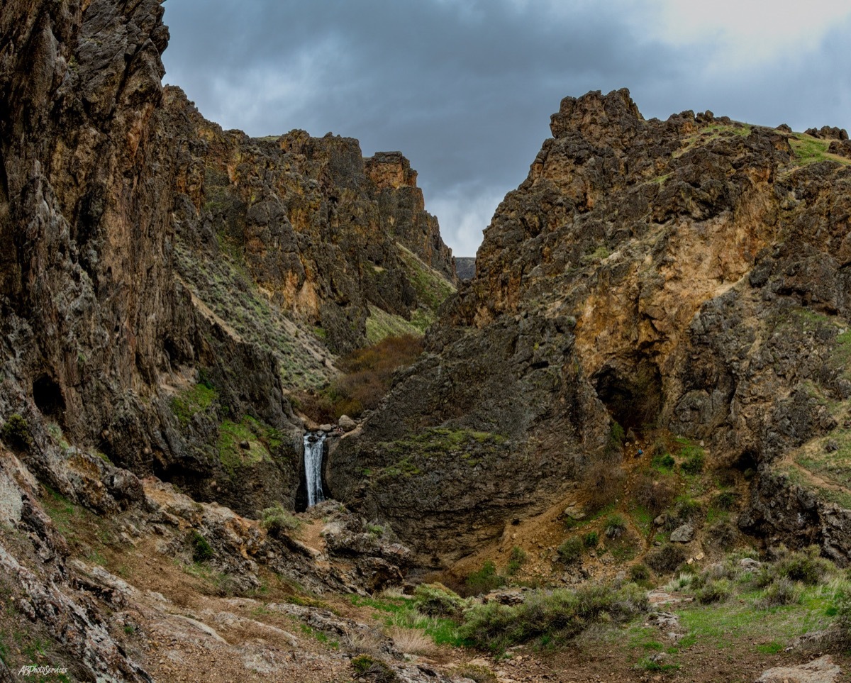 waterfall surrounded by canyons in idaho