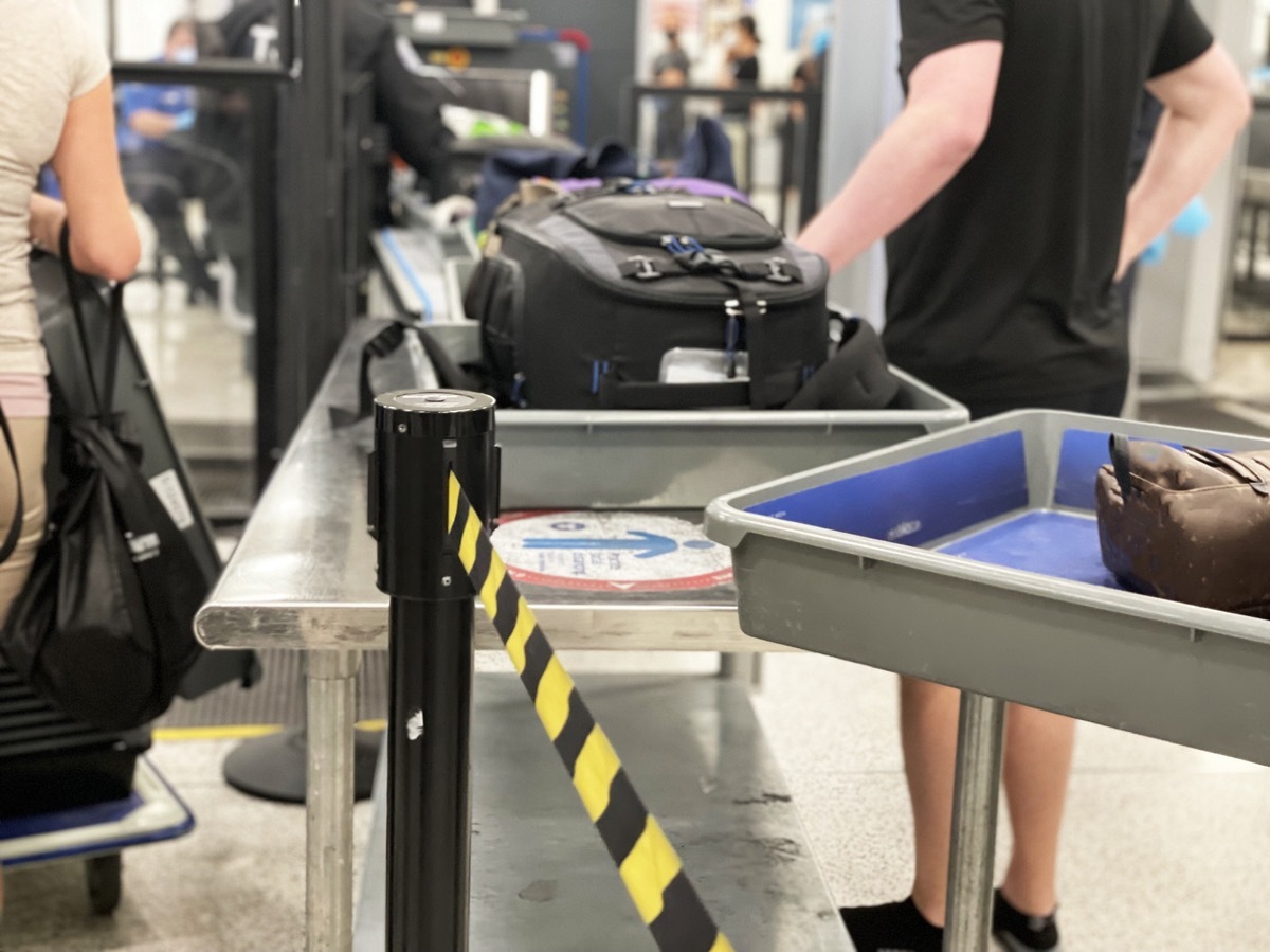 Check in luggages going through security line