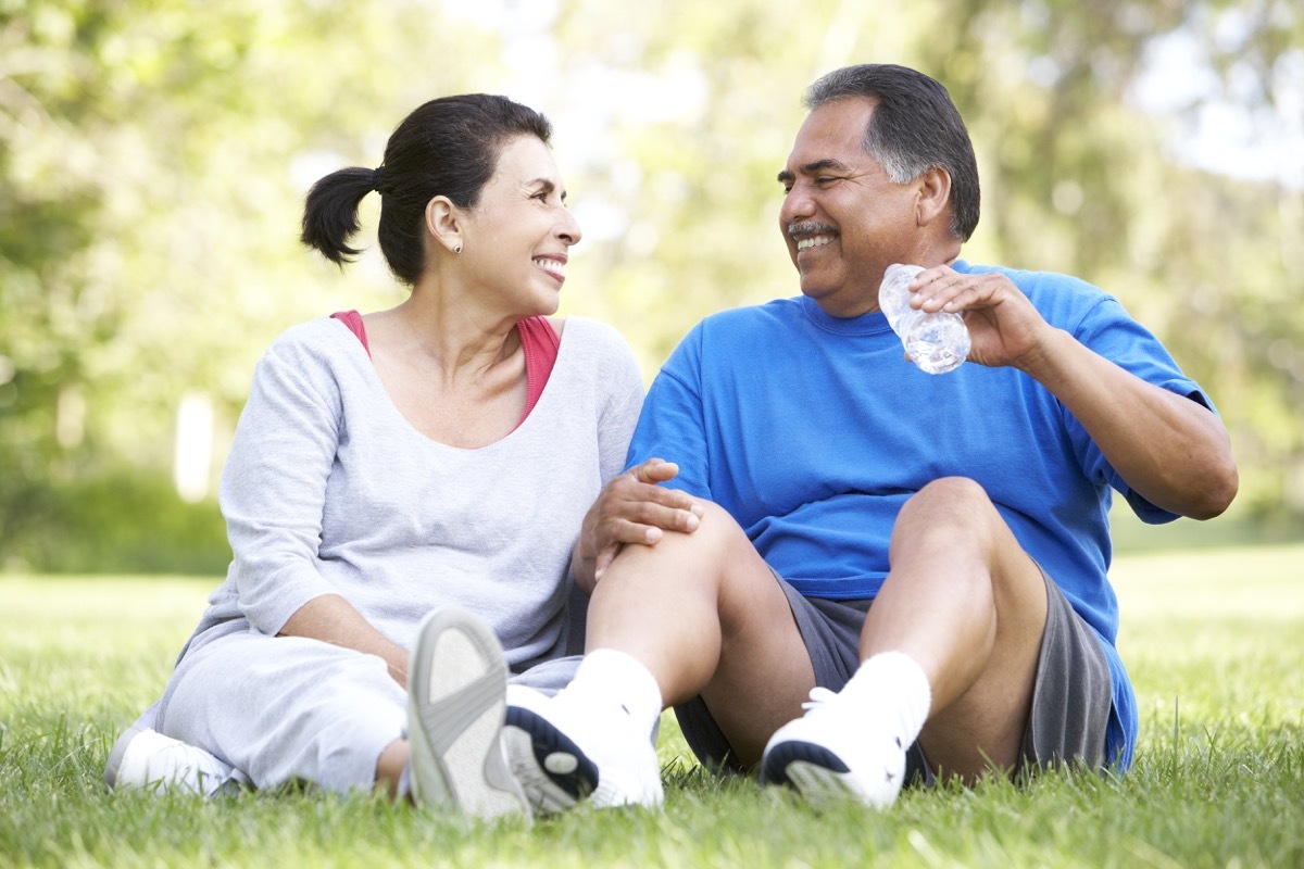 exercising with a friend and drinking water, over 50 fitness