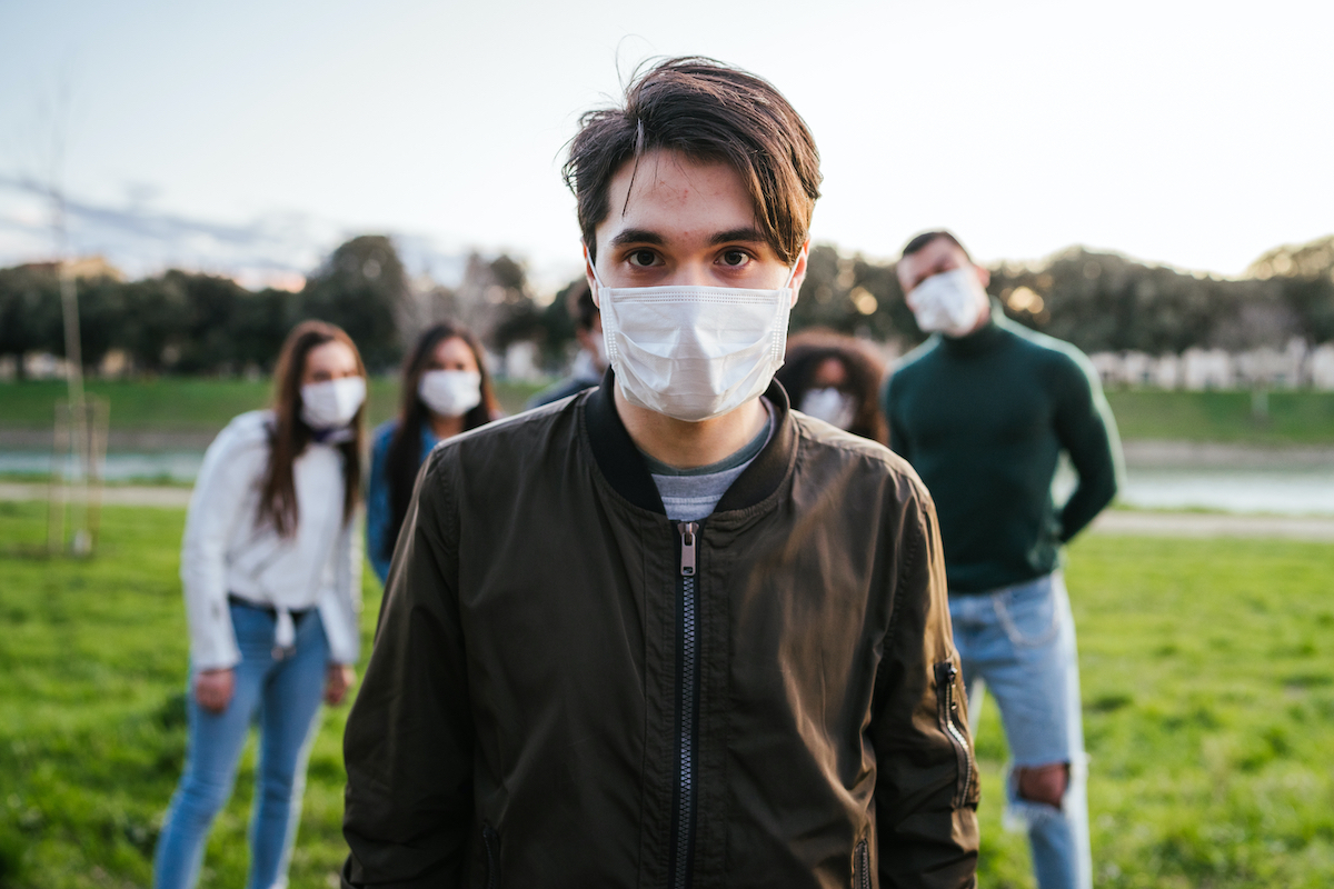 friends hanging out wearing masks