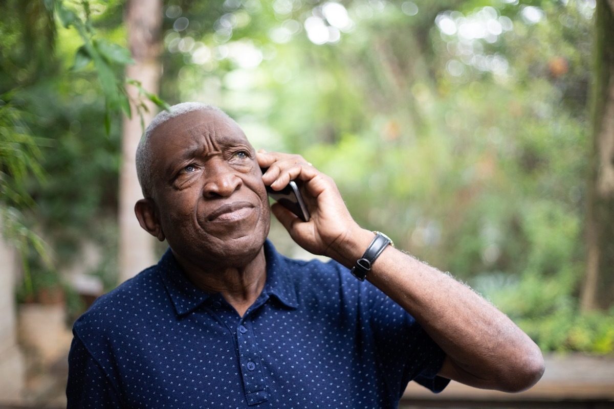 Man Using His Mobile Phone