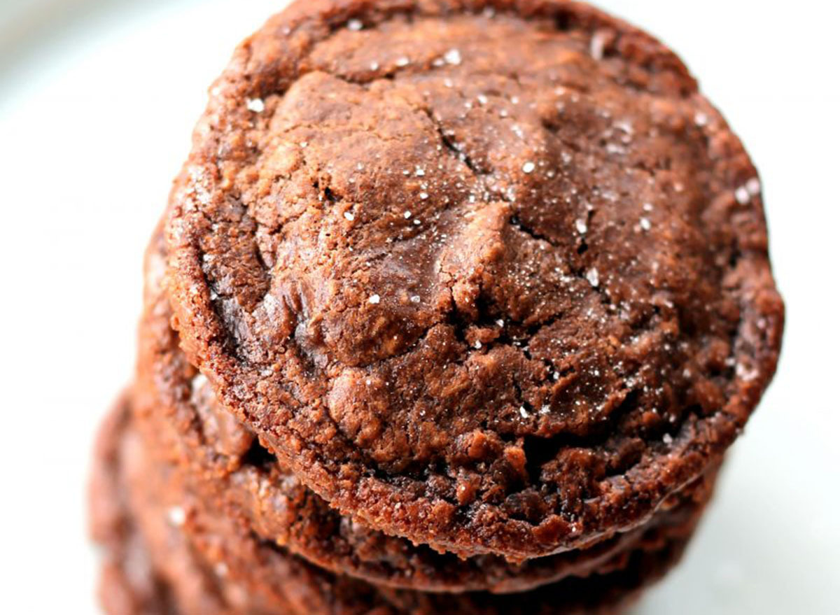 Nutella cookies with sea salt stacked on top of each other