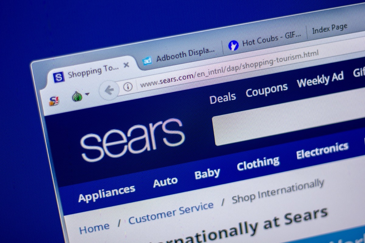 Homepage of Sears website on the display of PC, url - Sears.com.