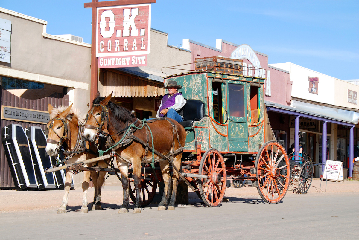 A historic horse-drawn coach in front of the O.K. Corral in the western town of Tombstone, Arizona.