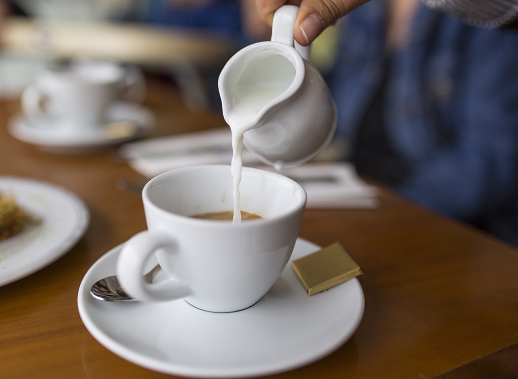 creamer into coffee