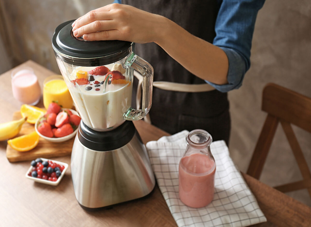 blending milk and fruit