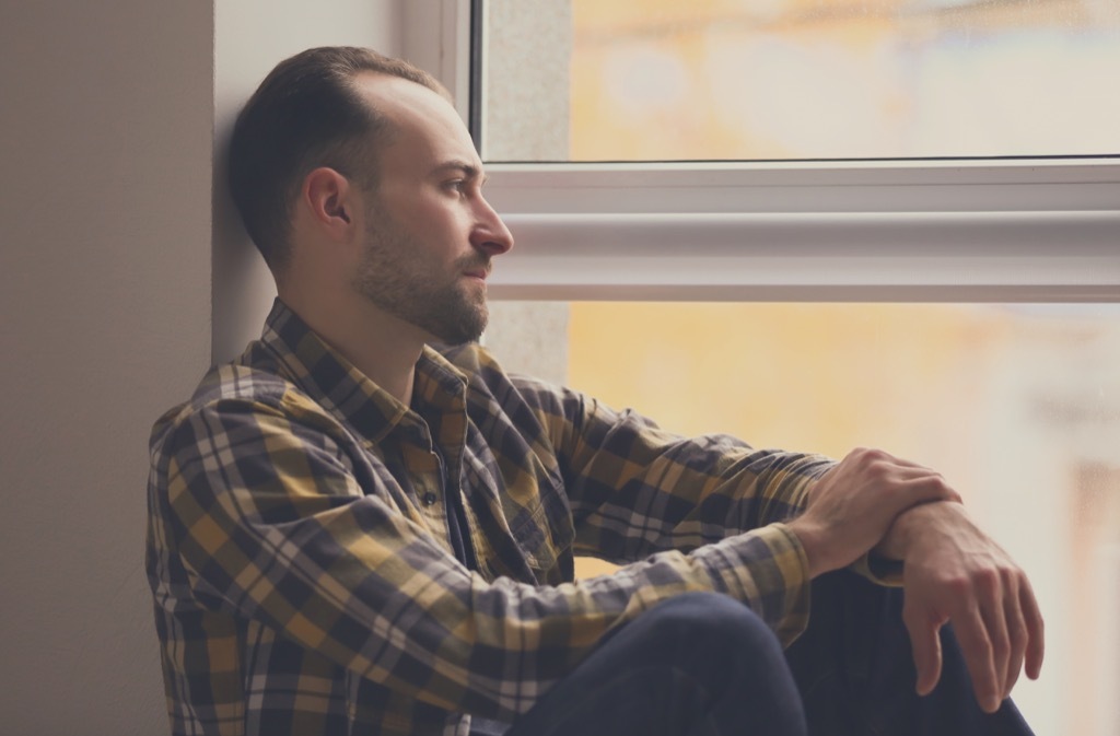 sad man by the window {Thyroid Problems}