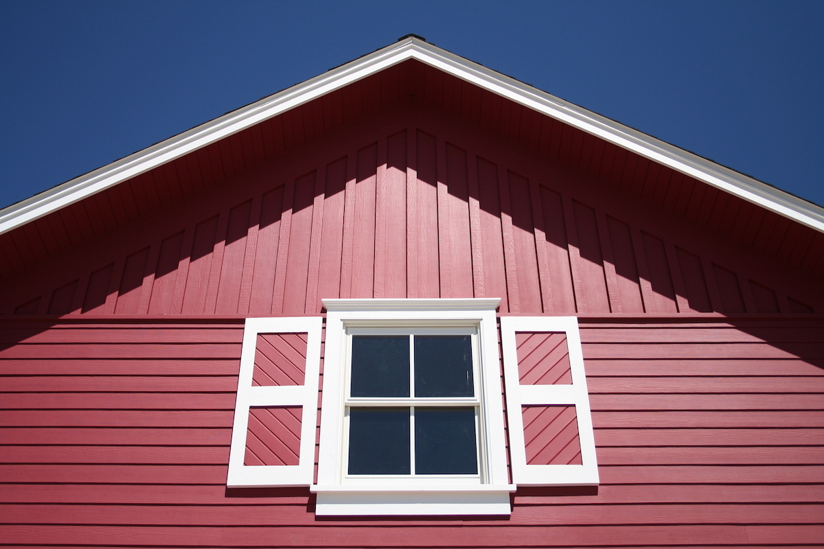 A barn in Montana with a great shadow and blue sky