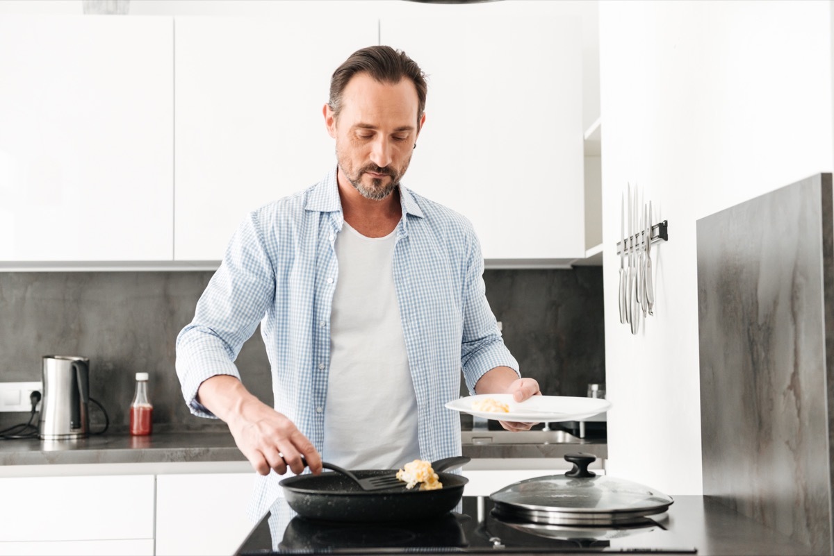 Man cooking in kitchen