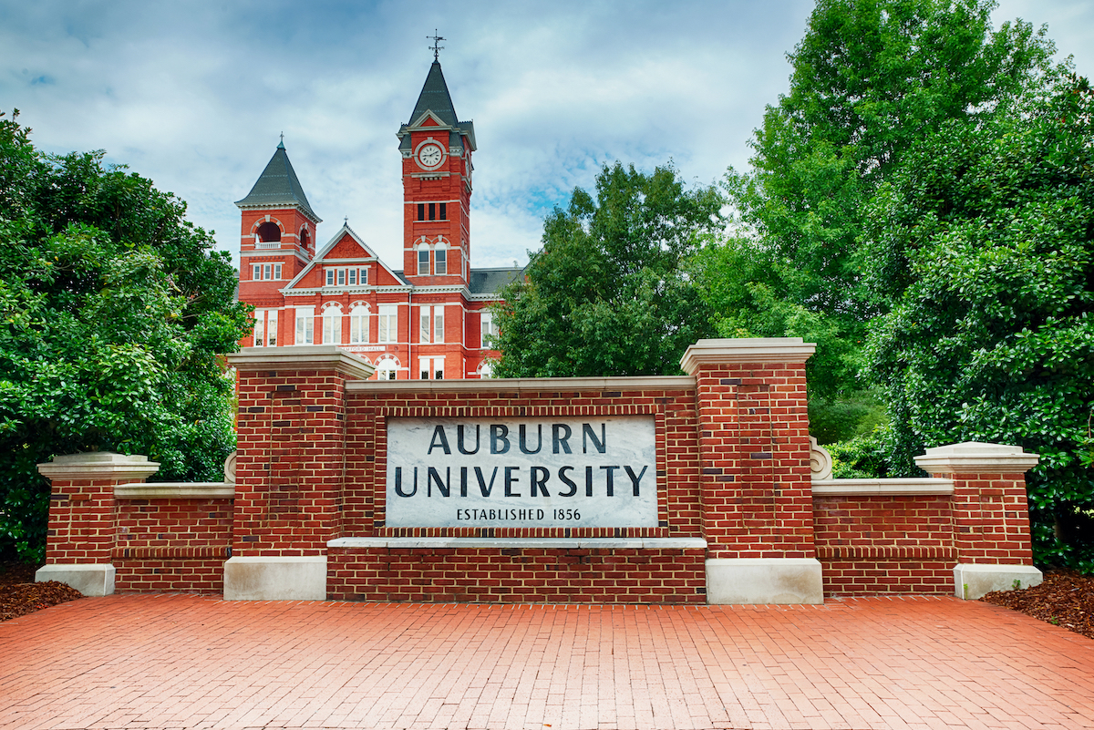 auburn unviersity entry sign on brick pathway