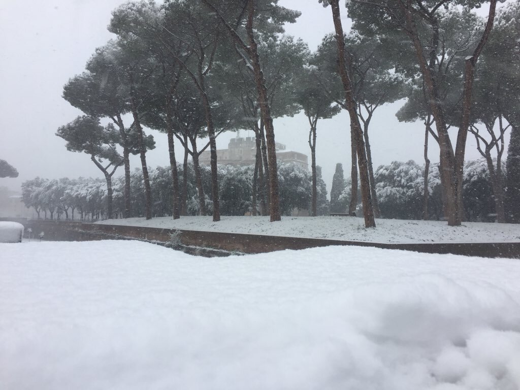 snow covers mausoleum of hardian rome weather