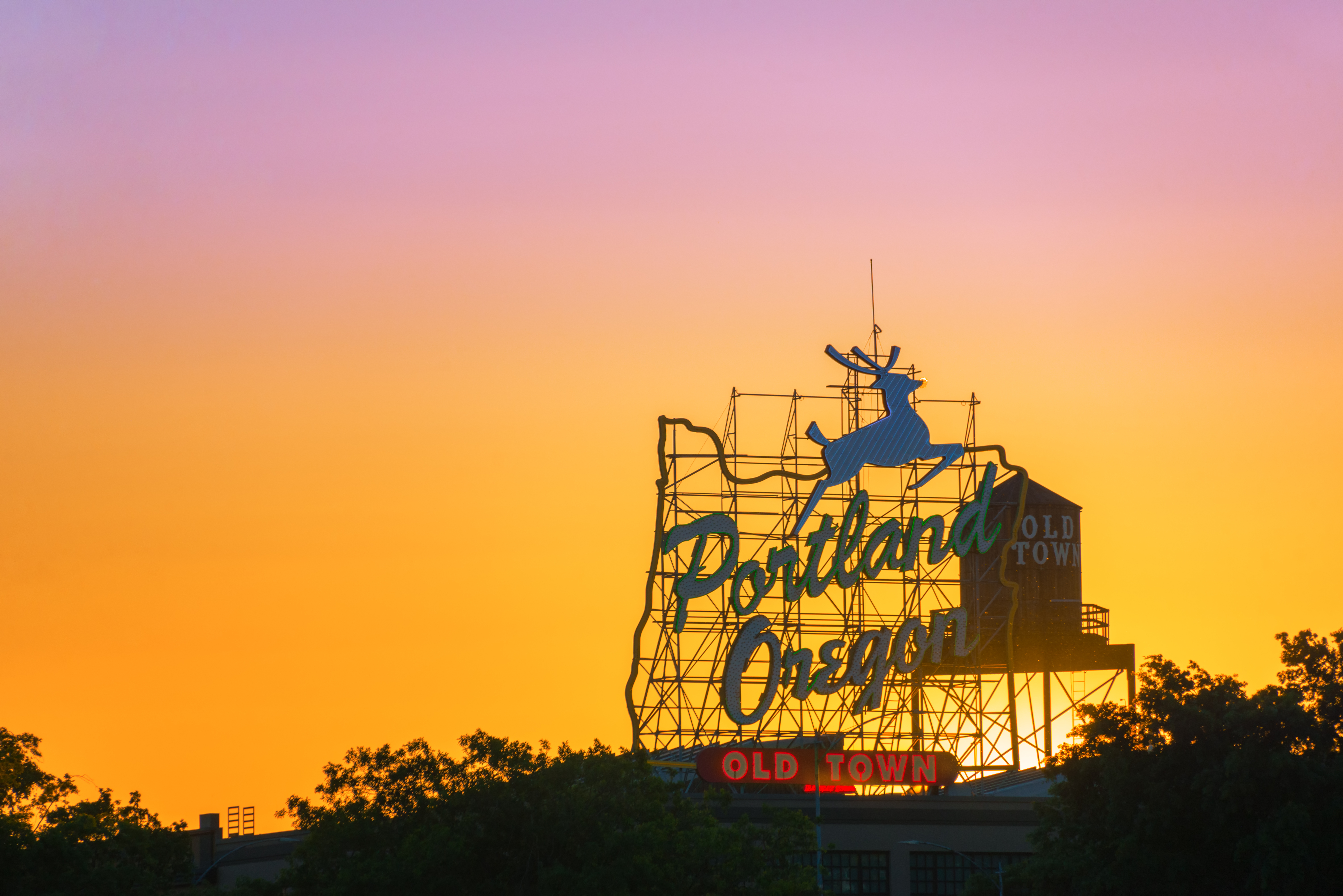 things to do in portland - sunset over city sign