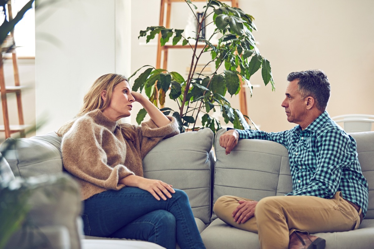 Shot of an affectionate mature couple sitting on the sofa at home