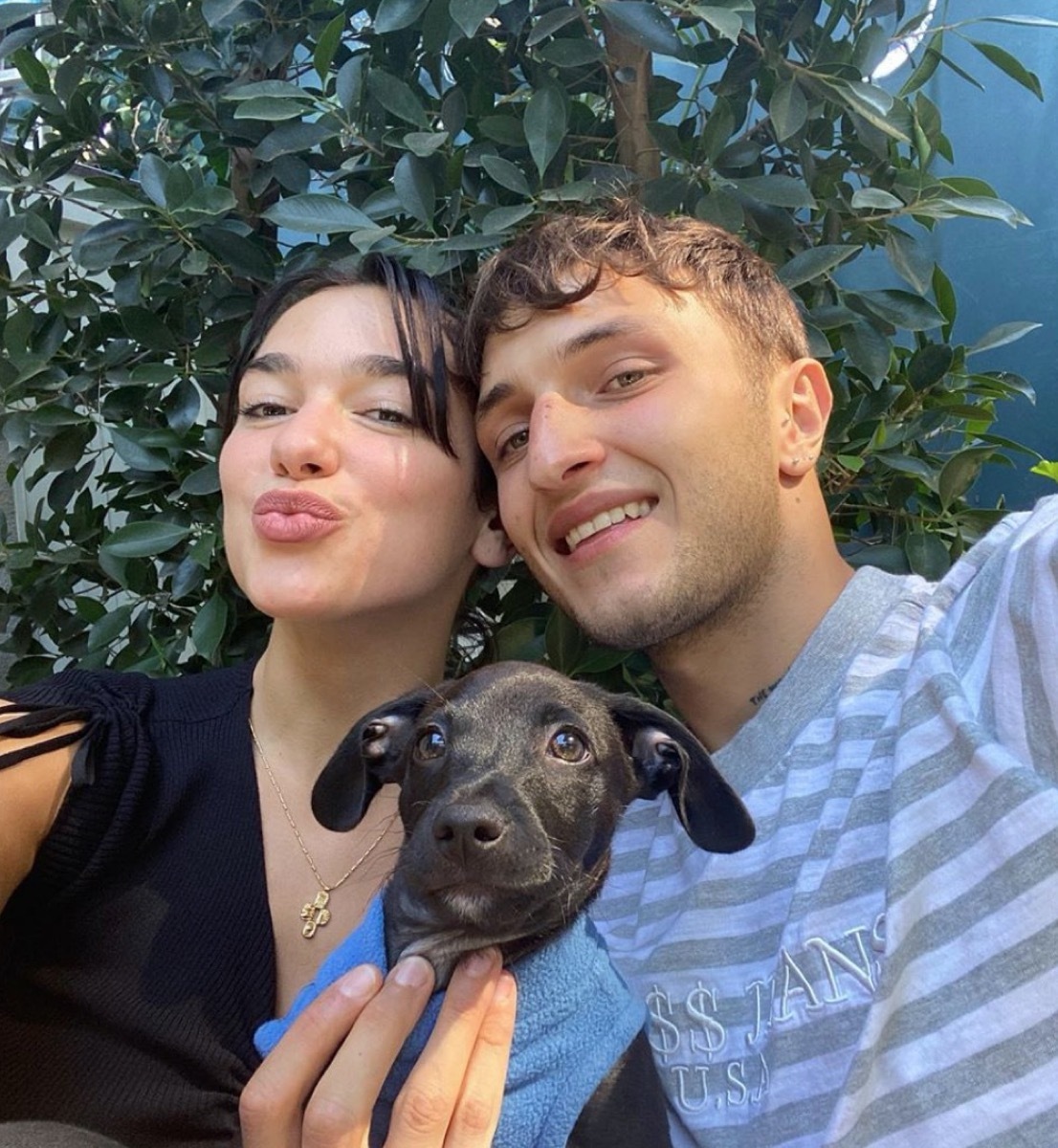 dua lipa and anwar hadid with black dog